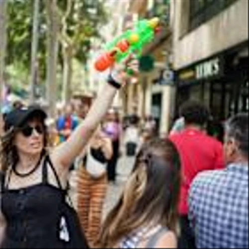Spaniards turn water guns on visitors in Barcelona and Mallorca to protest mass tourism