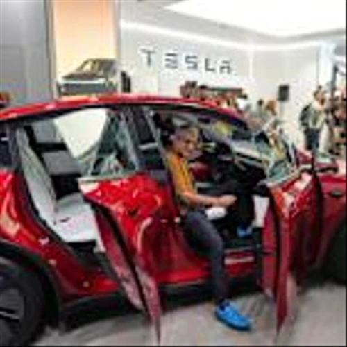 Tesla stock in search of an earnings charge: Opening Bid top takeaways