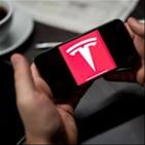 ETFs in Spotlight as Tesla Tops Q4 Earnings, Dips on Revenue Miss