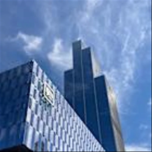 General Motors logo affixed to top of new Hudson's office building