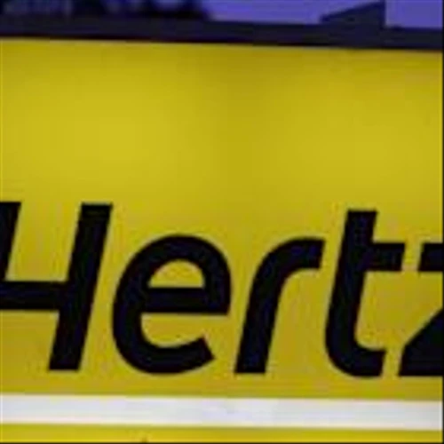 Charles Schwab & American Express earnings, Hertz stock jumps