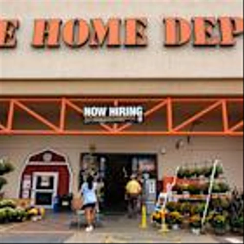Home Depot stock falls after company cuts full-year outlook as consumers put off home improvement projects
