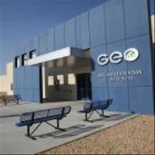 Prison company retaliated against detained immigrants, labor board says