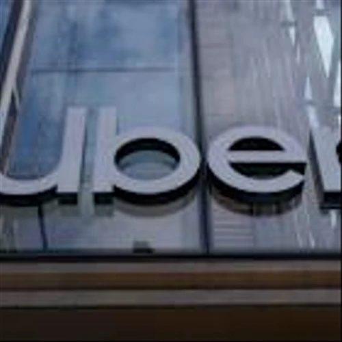 Uber targets commuters with cheaper pooled rides, price-lock pass