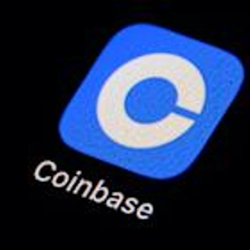 Coinbase stock rises after company posts higher revenue on crypto market upswing