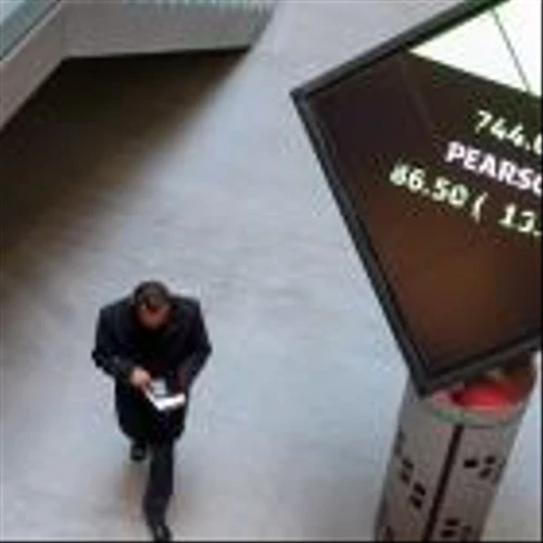 Pearson Shares Fall After Lower Revenue, Pretax Profit