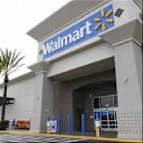 Top Stock Movers Now: Walmart, Intel, Domino's Pizza, Arista Networks, and More