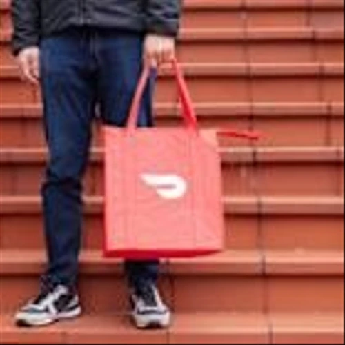 Same-Day Delivery Arms Race Escalates as DoorDash, Uber Court Retailers