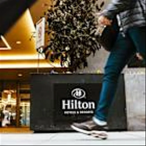 Hilton Posts Profit Growth, Boosts 2025 Earnings View on Solid Demand