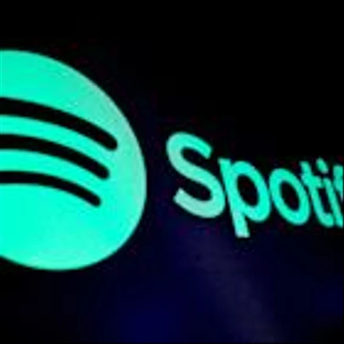 Spotify stock slides after reporting Q2 loss, weaker forecast after record rally