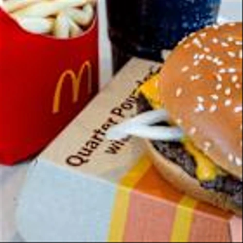 McDonald’s Shares Slip as GLP-1 Risks Spur Rare Sell Rating