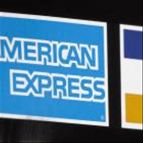 AmEx 4Q profits jump 23% as cardmembers carry heftier balances