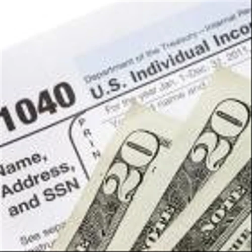Should you sign a loan or pay a fee to get your tax refund early? Here’s what you need to know