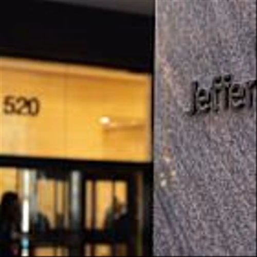 Goldman, Jefferies Cut at Oppenheimer on M&A Rebound Doubt