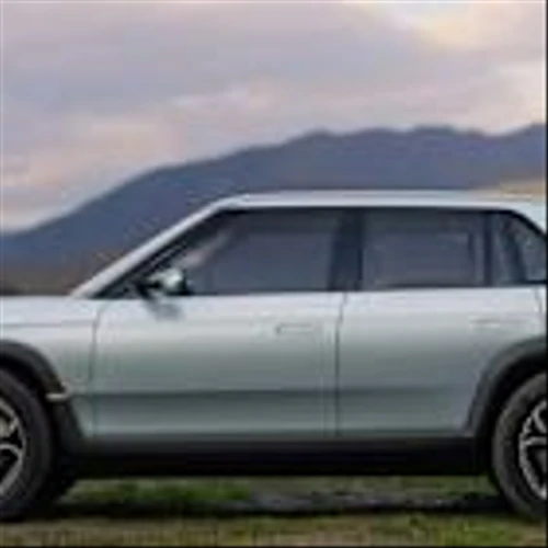 Tesla Is All-In On Autonomous Driving And AI. Is Rivian Poised To Compete?