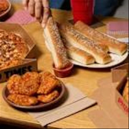 /C O R R E C T I O N -- Pizza Hut/