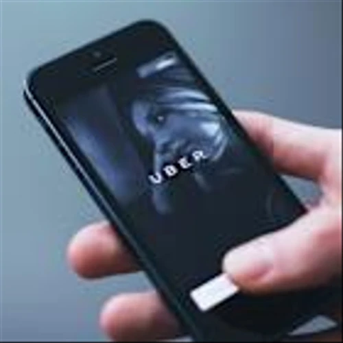 Uber, Lyft Face Disruption as Tesla Seeks to Expand Robotaxi Service, Wedbush Says