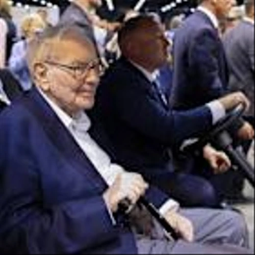 Berkshire profit rises, cash soars to record