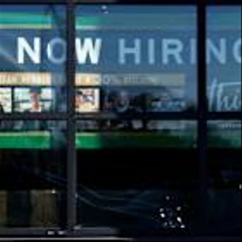 US applications for jobless benefits inch up last week to a still-low 200,000