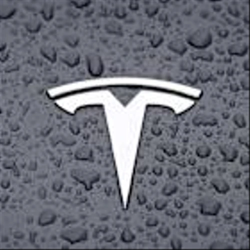 Tesla Stock Nears Early Buy Point Amid Volatile Market, Looming Earnings