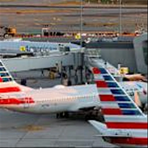 Earnings live: American Airlines restores forecast, Tesla stock falls in wake of earnings miss