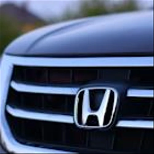 Honda profit slides 33.8% in first half; trims 2030 EV sales target