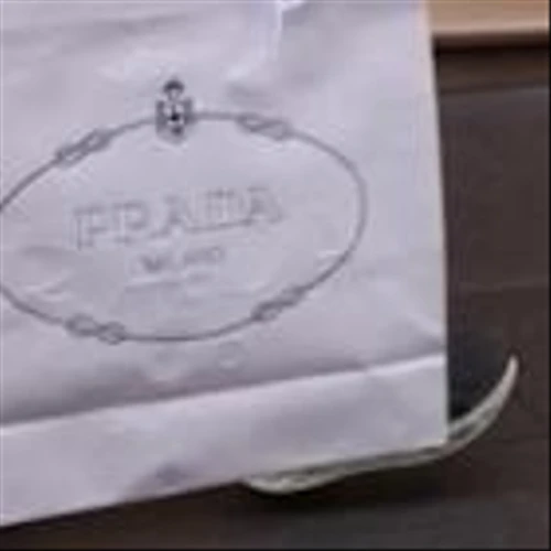 Prada completes Versace takeover after long courtship