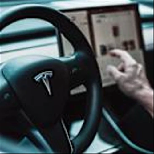 Tesla (TSLA) Faces Analyst Caution Ahead of Earnings as Risks Loom